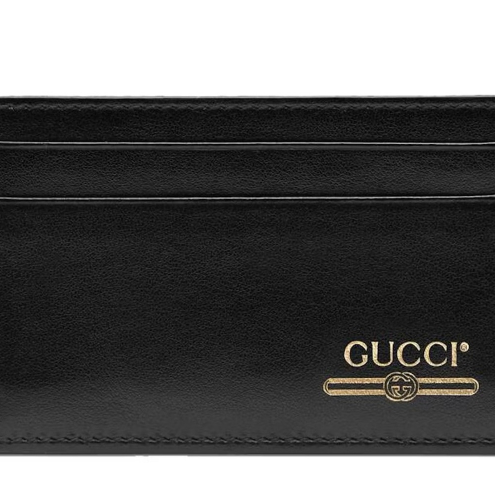 NWOT Authentic Gucci Black and Gold Leather Card Holder.